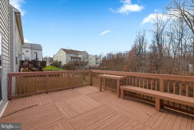 a view of a balcony with chairs