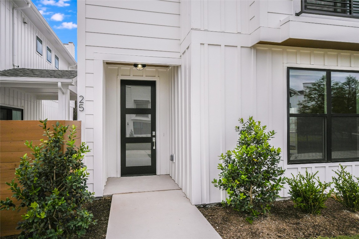 a front view of a house with a garage