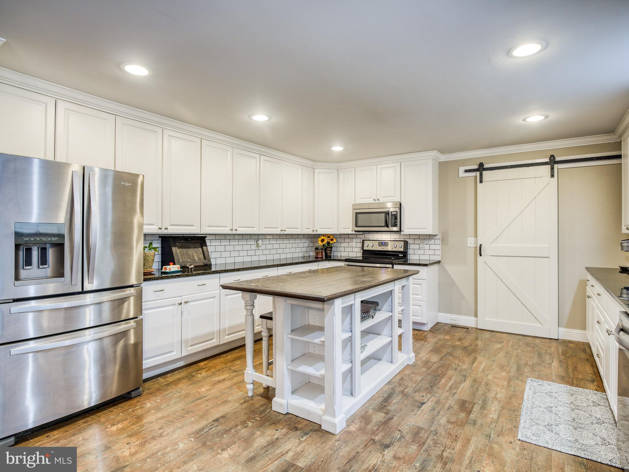 170 Quarry Road Bunker Hill, WV 25413 - Photo 13 of 30 Kitchen island conveys