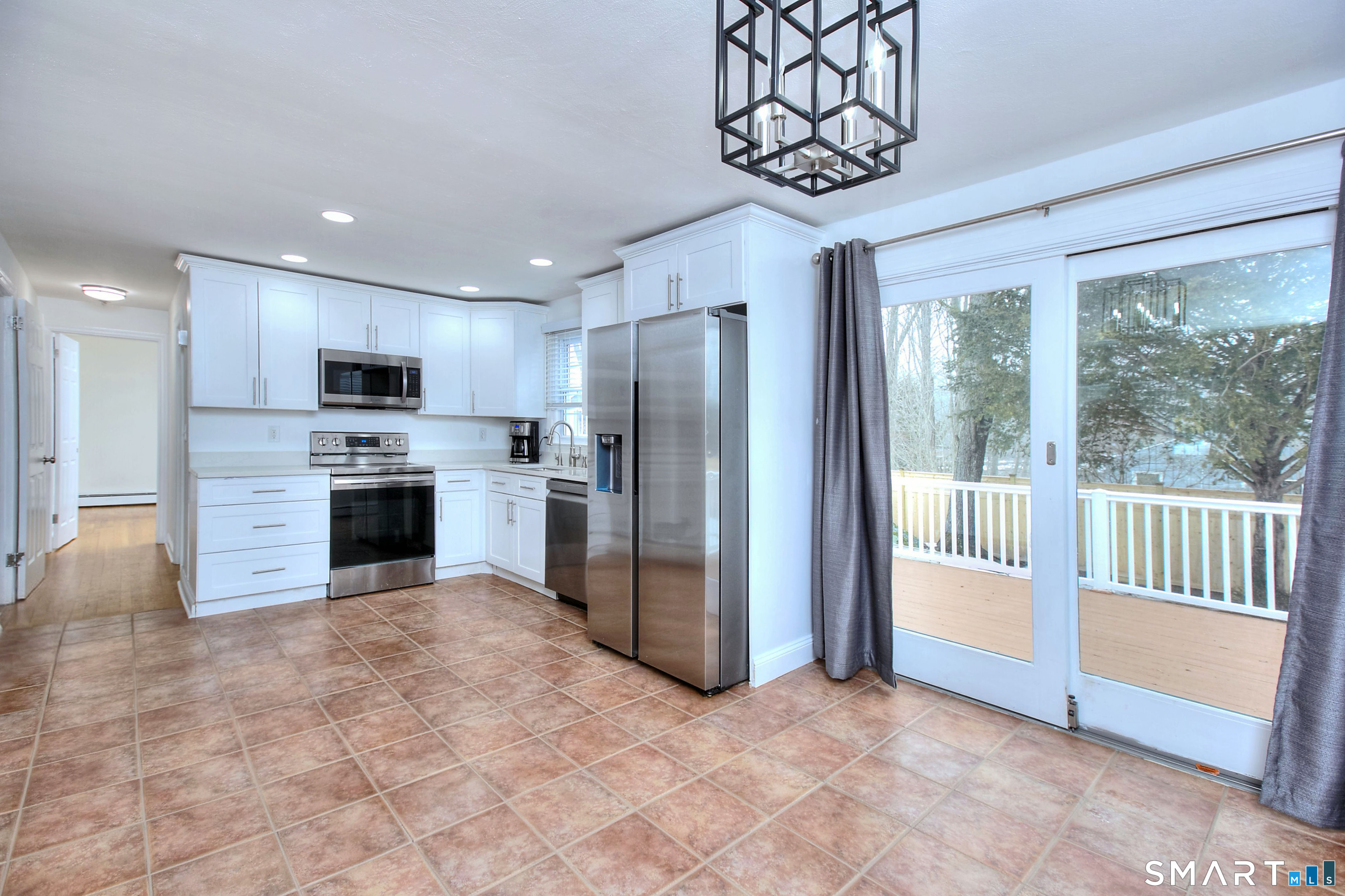 46 Crest Road Ridgefield, CT 06877 - Photo 12 of 41 a view of an empty room with a fireplace