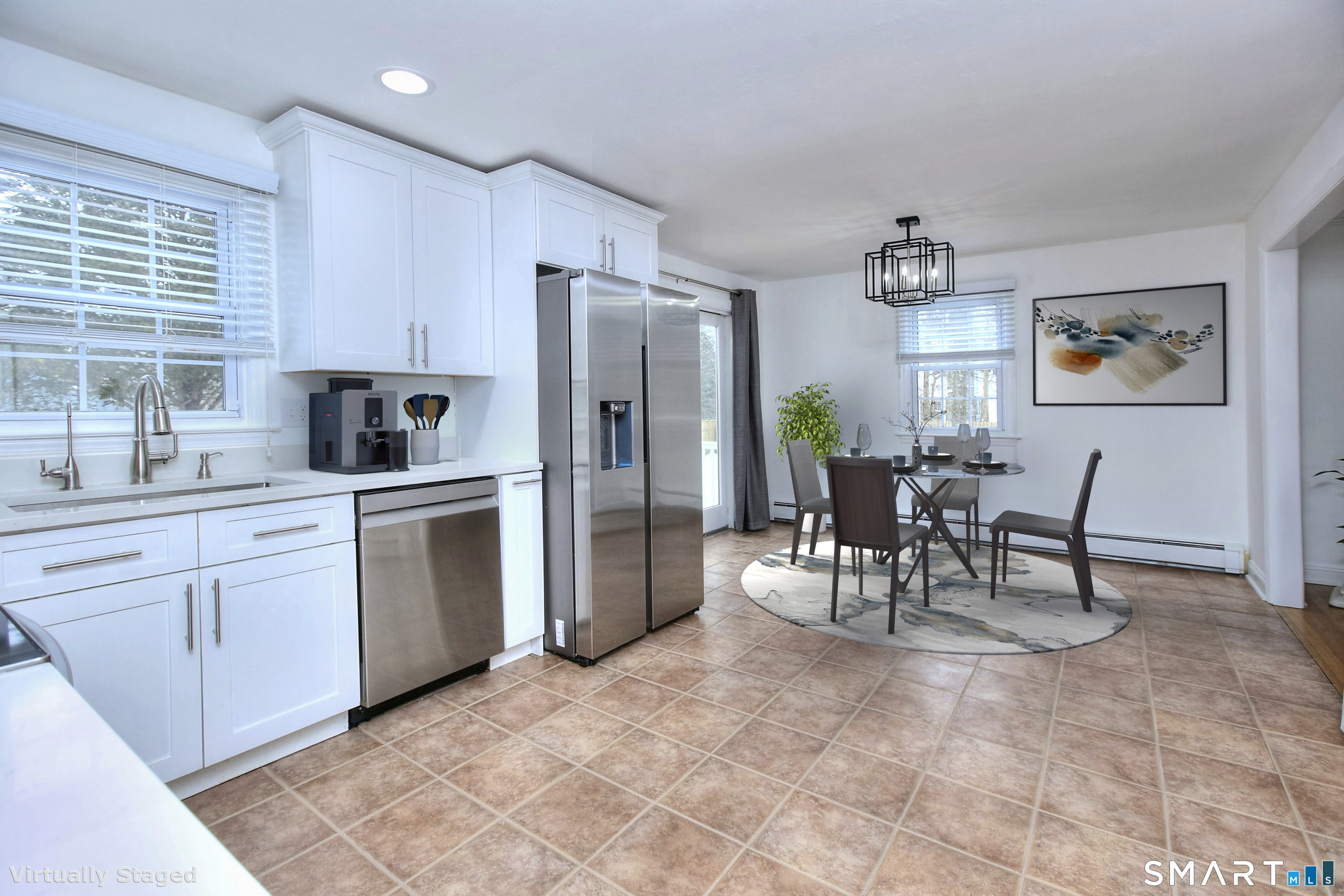 46 Crest Road Ridgefield, CT 06877 - Photo 13 of 41 a view of kitchen with sink refrigerator dining table and chairs