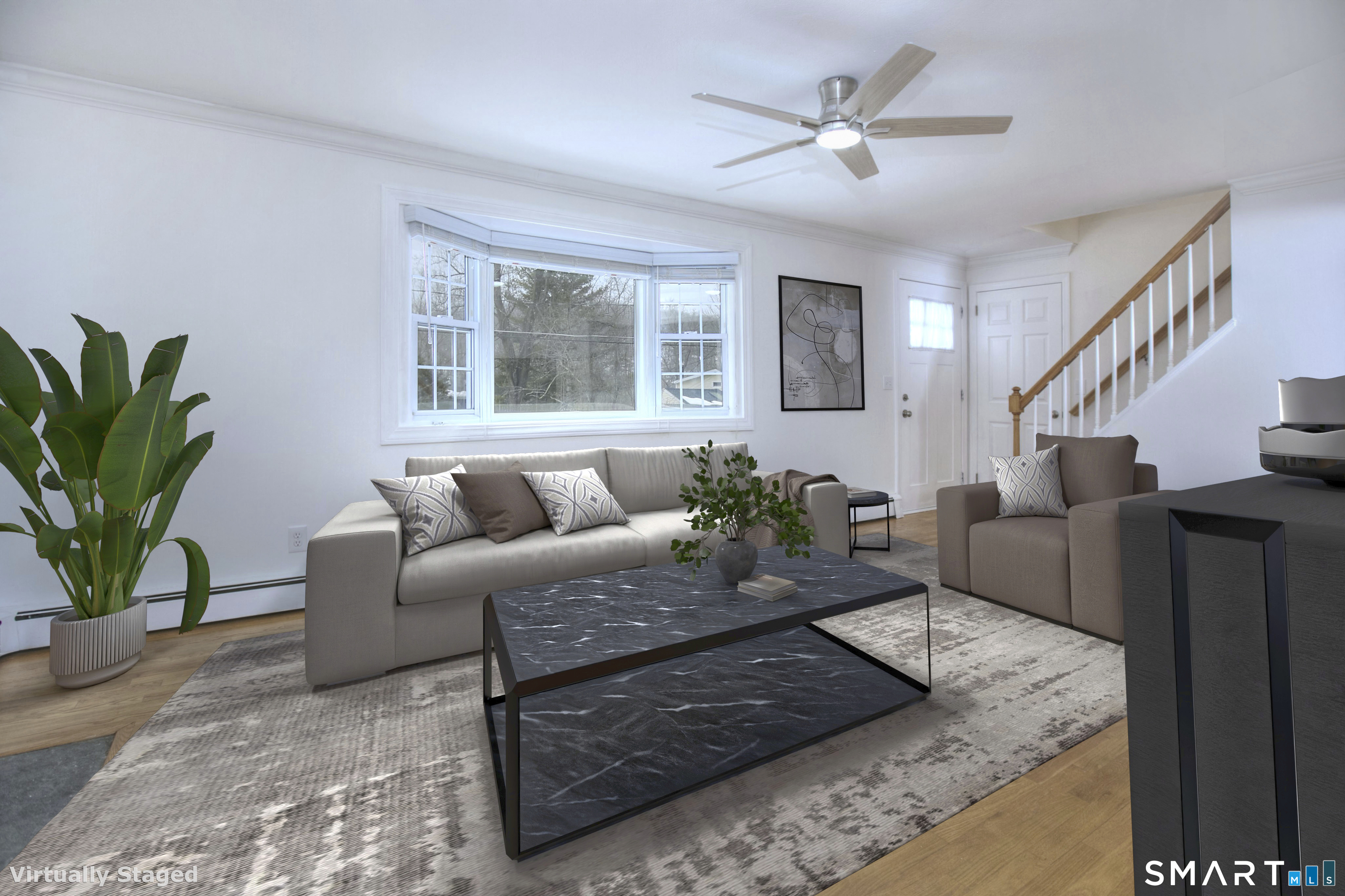 46 Crest Road Ridgefield, CT 06877 - Photo 17 of 41 a living room with furniture and a potted plant