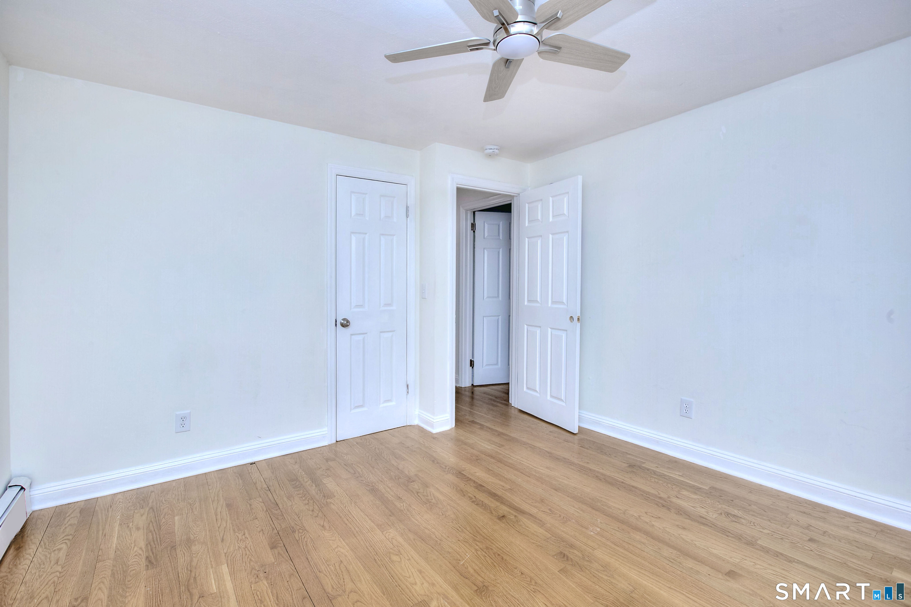 46 Crest Road Ridgefield, CT 06877 - Photo 27 of 41 a view of a room with wooden floor