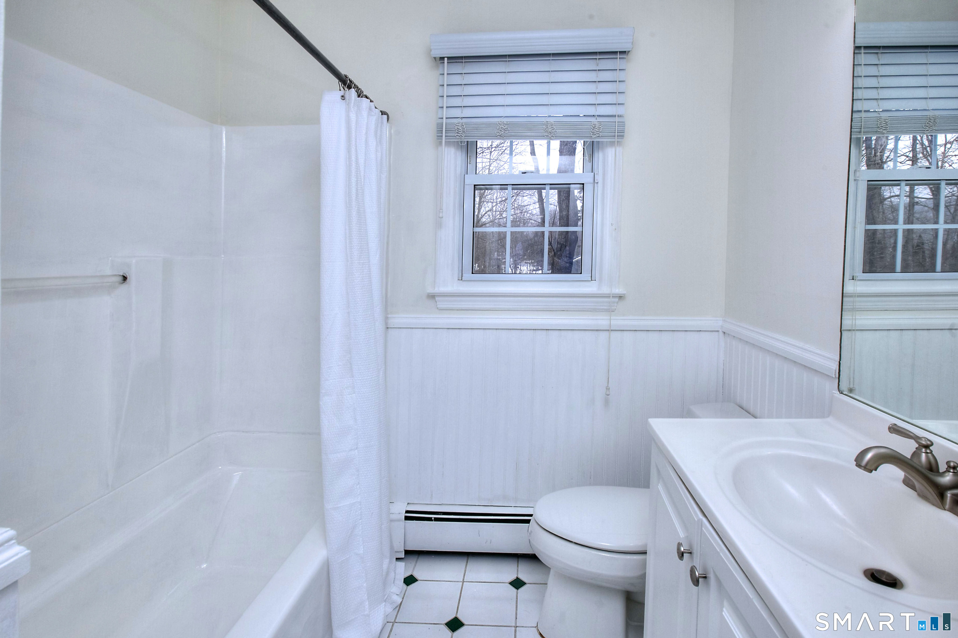 46 Crest Road Ridgefield, CT 06877 - Photo 29 of 41 a bathroom with a sink toilet and shower