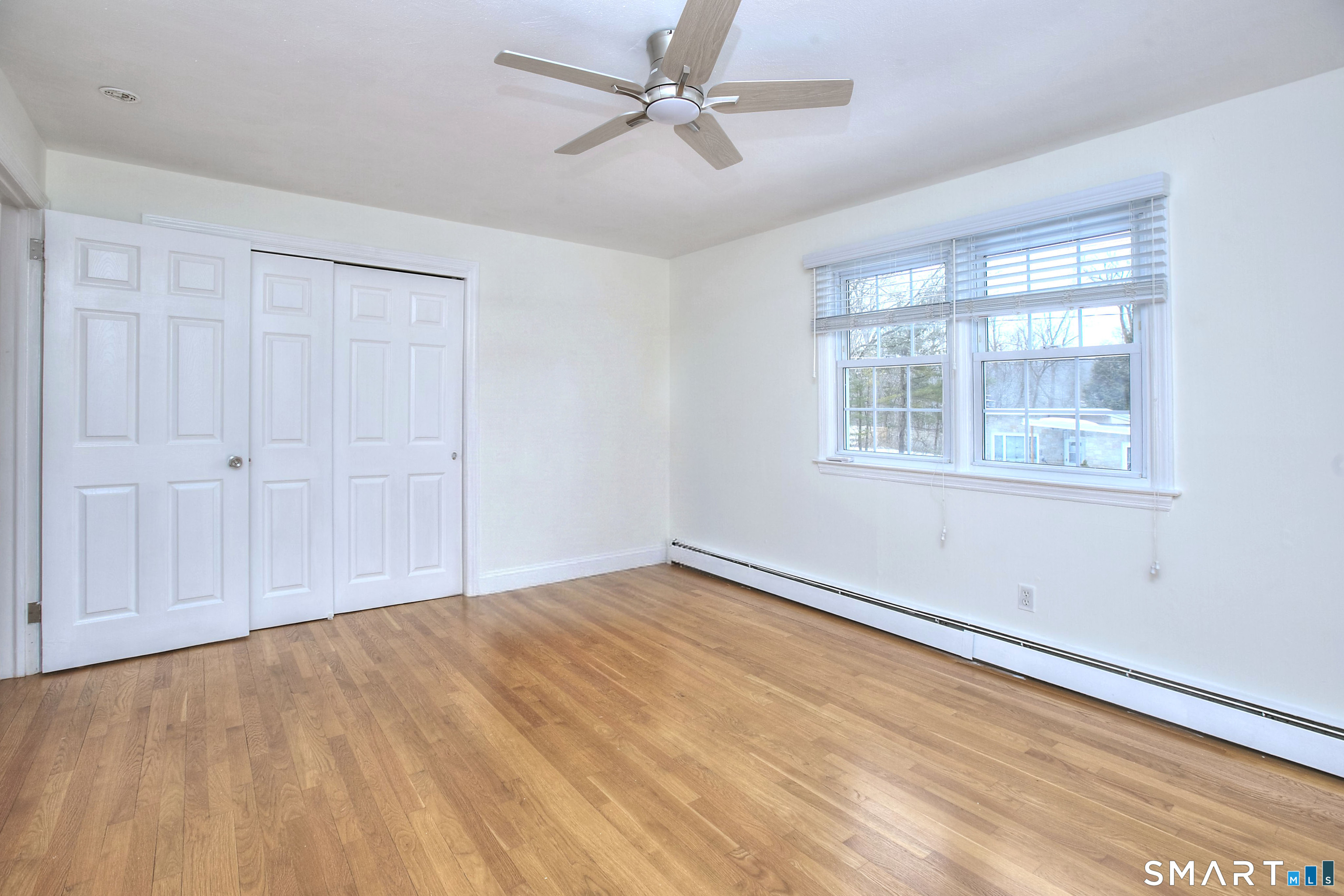 46 Crest Road Ridgefield, CT 06877 - Photo 30 of 41 a view of an empty room with a window