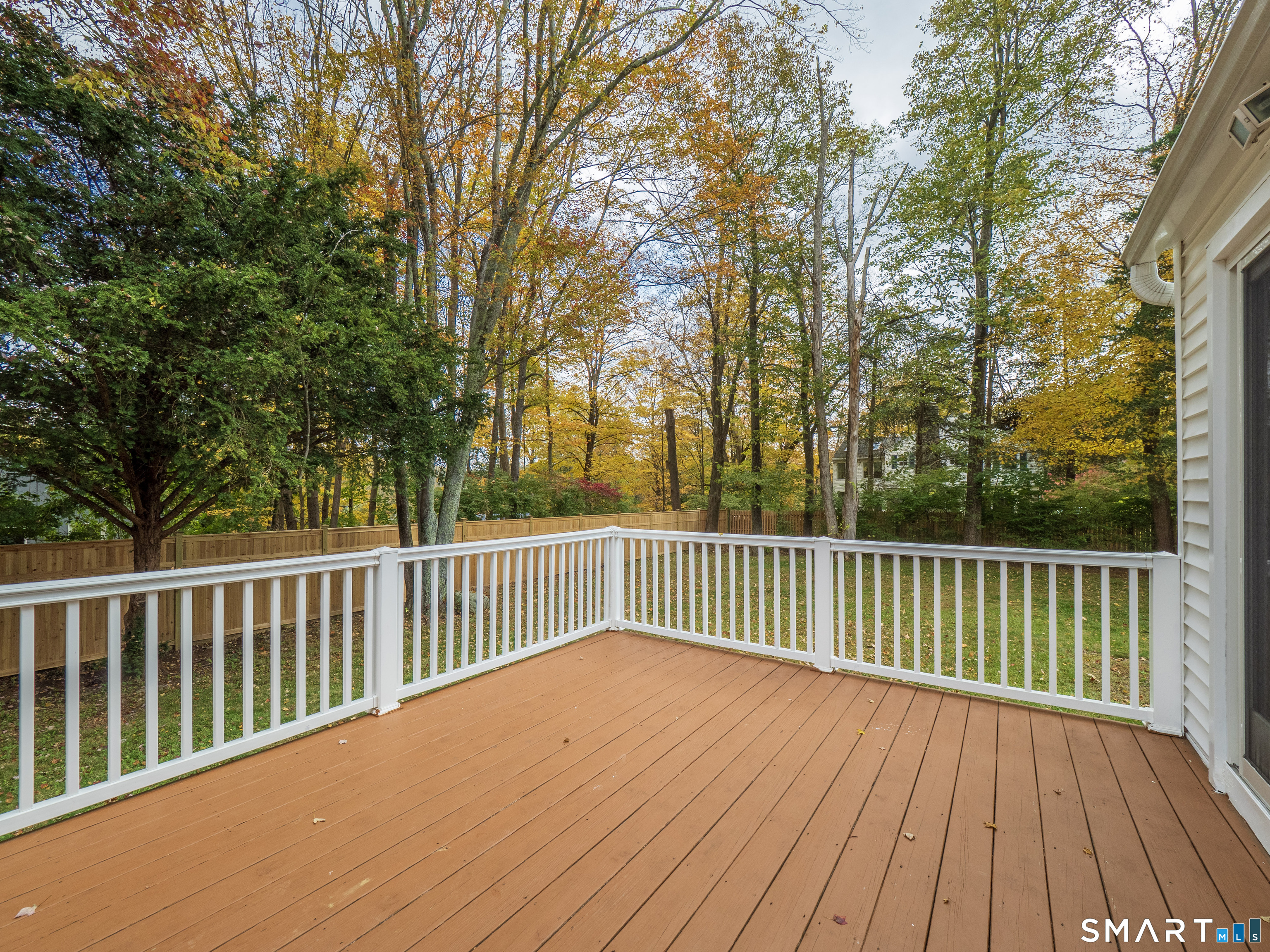 46 Crest Road Ridgefield, CT 06877 - Photo 32 of 41 a view of balcony with wooden floor and fence