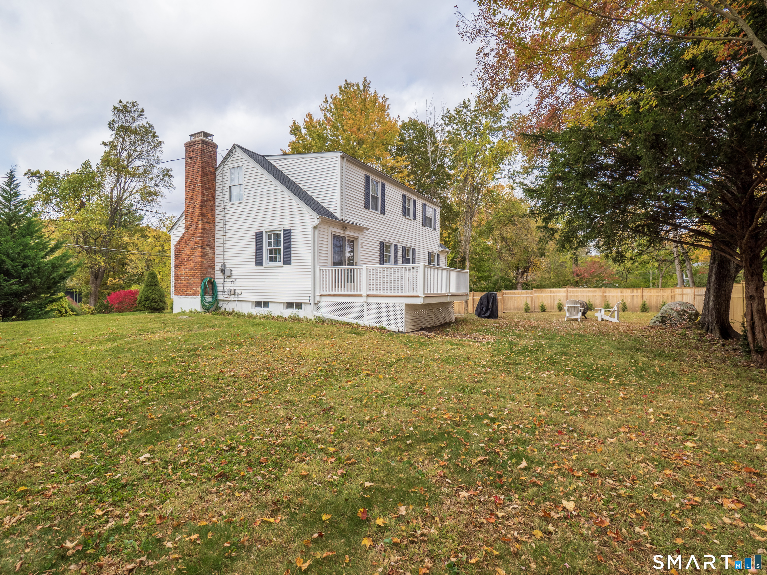 46 Crest Road Ridgefield, CT 06877 - Photo 35 of 41 a view of a house with a yard