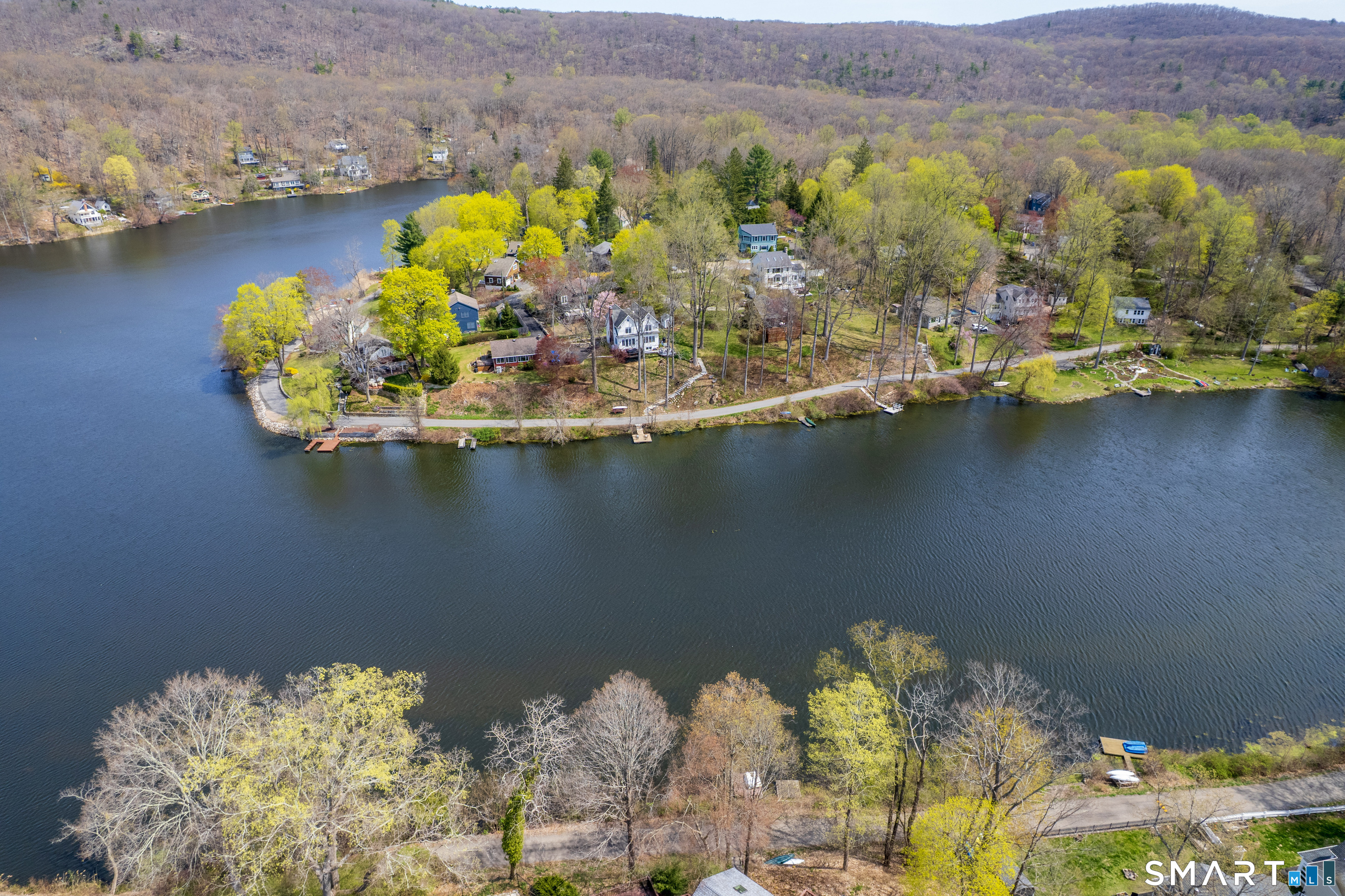 46 Crest Road Ridgefield, CT 06877 - Photo 39 of 41 a view of a lake with a mountain view