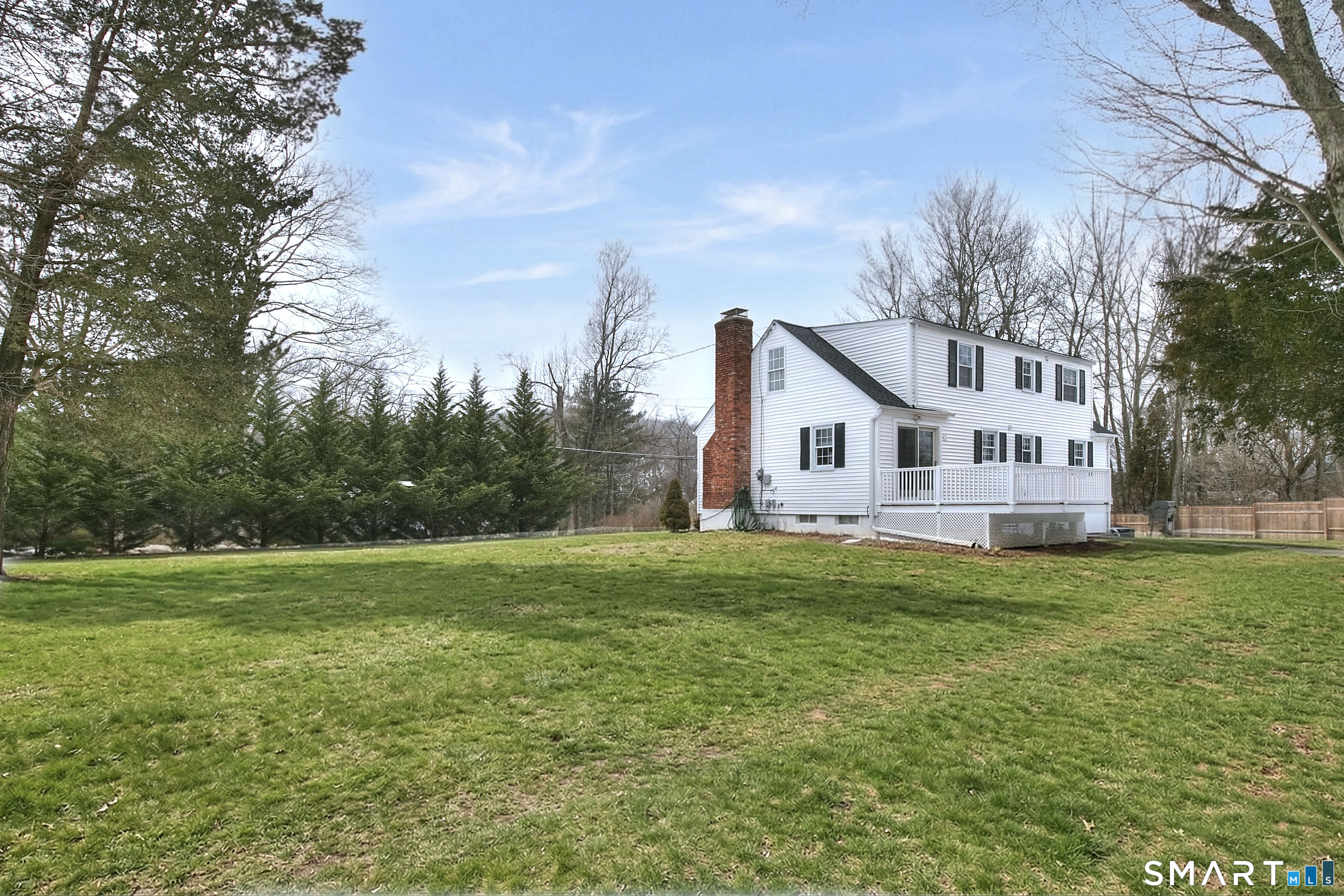 46 Crest Road Ridgefield, CT 06877 - Photo 6 of 41 a house view with a garden space