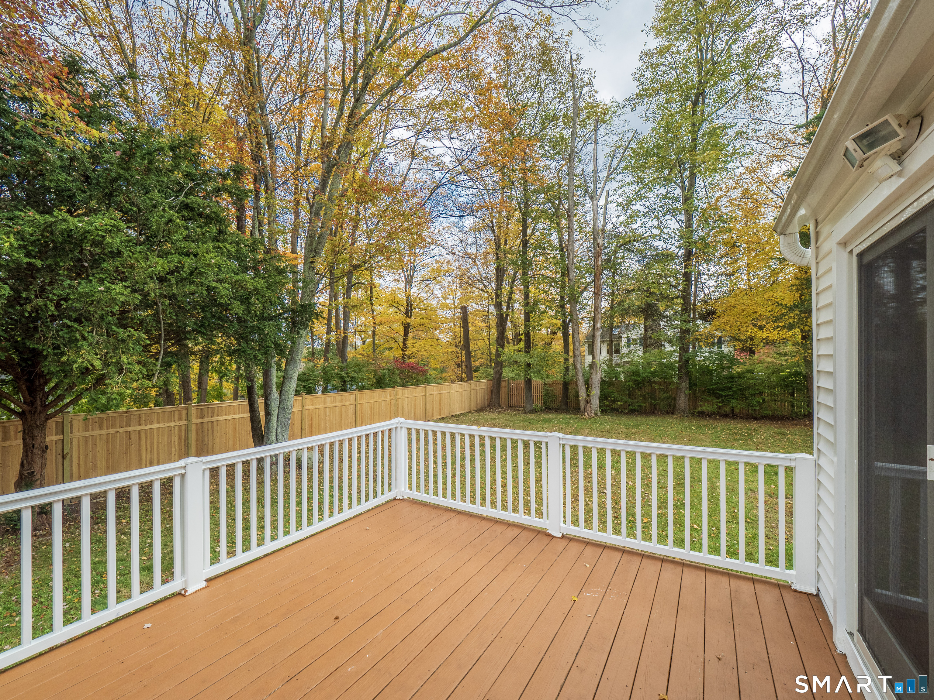 46 Crest Road Ridgefield, CT 06877 - Photo 9 of 41 a view of a wooden roof deck
