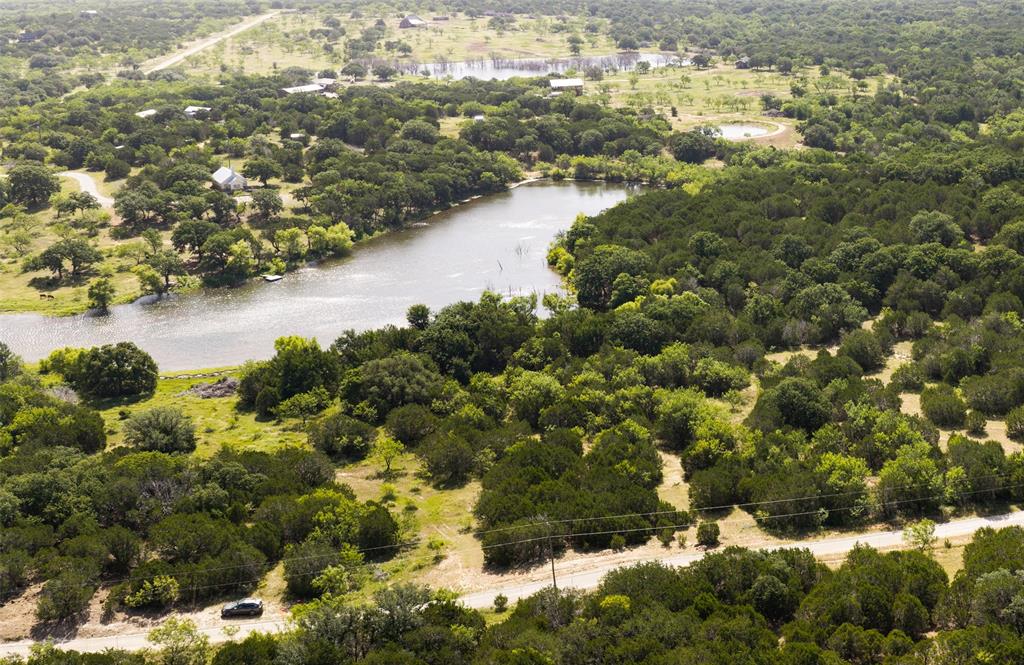 235 Big Bear Loop Strawn, TX 76475 - Photo 35 of 40 a view of a lake with trees