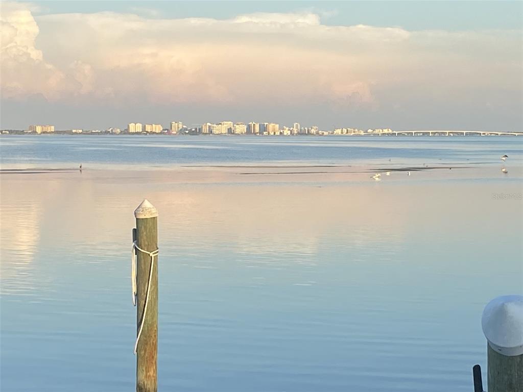 2600 Harbourside Drive, Unit R9 Longboat Key, FL 34228 - Photo 15 of 26 a view of an ocean and beach
