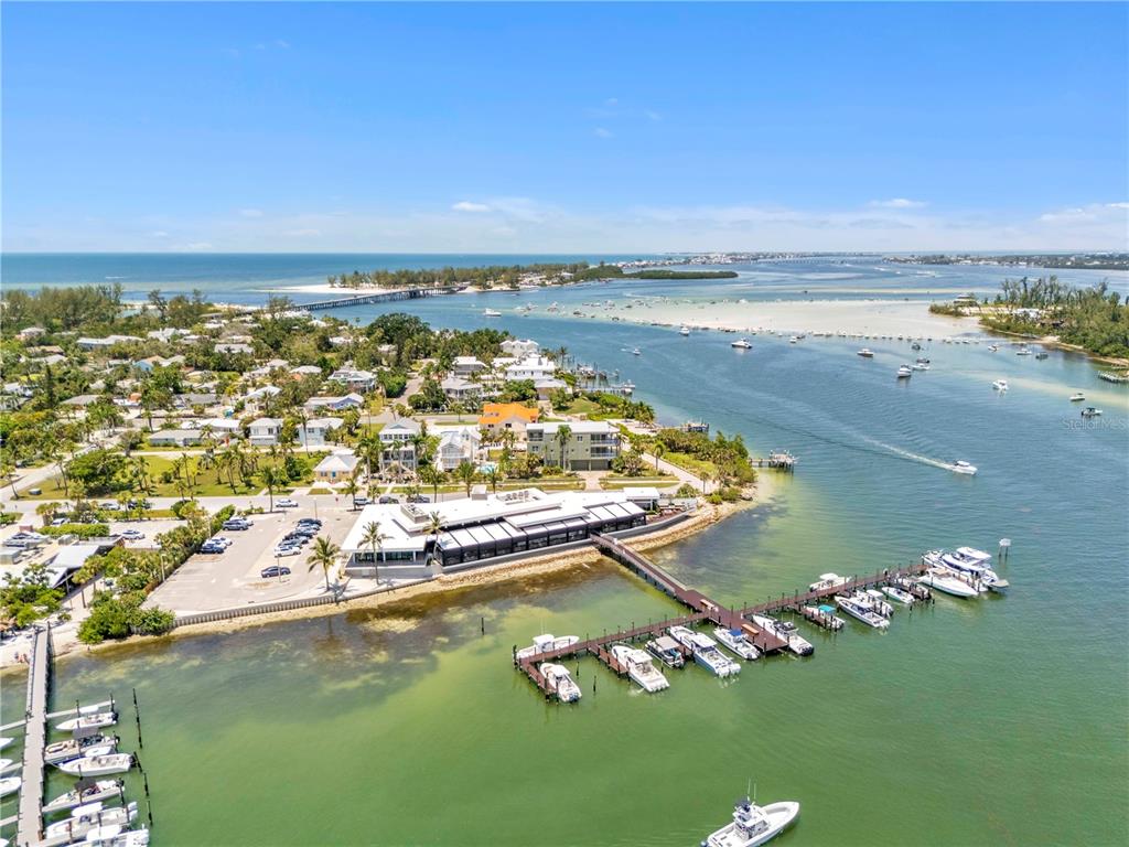 2600 Harbourside Drive, Unit R9 Longboat Key, FL 34228 - Photo 19 of 26 an aerial view of a house with a lake view