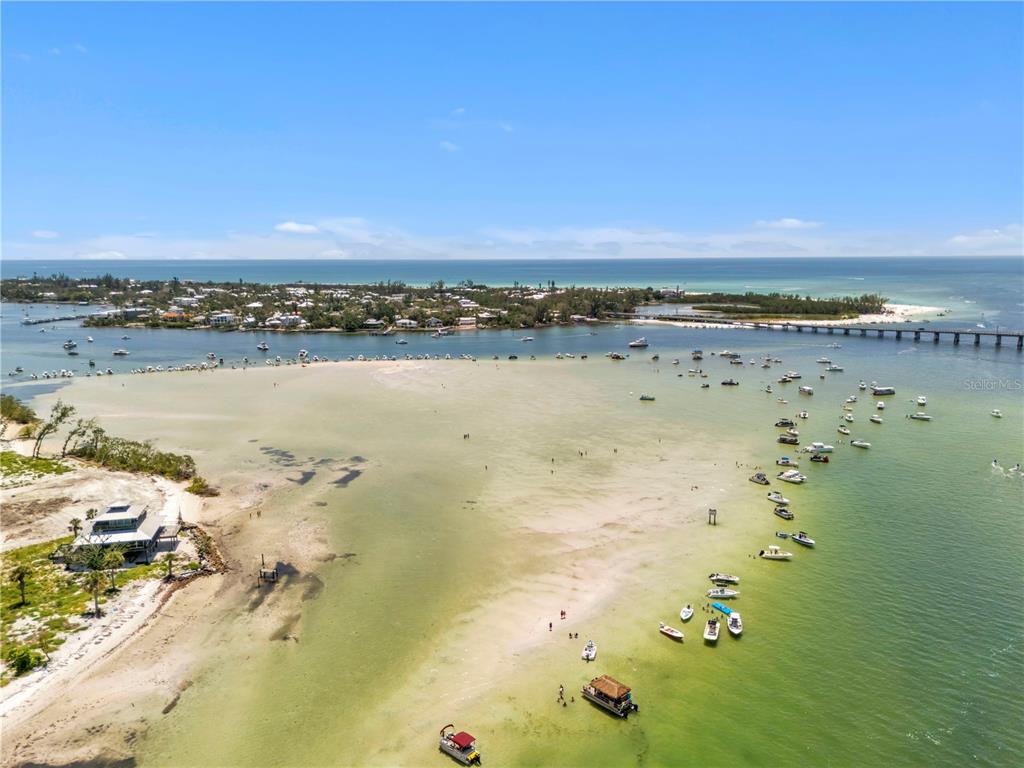 2600 Harbourside Drive, Unit R9 Longboat Key, FL 34228 - Photo 20 of 26 a view of an ocean and beach