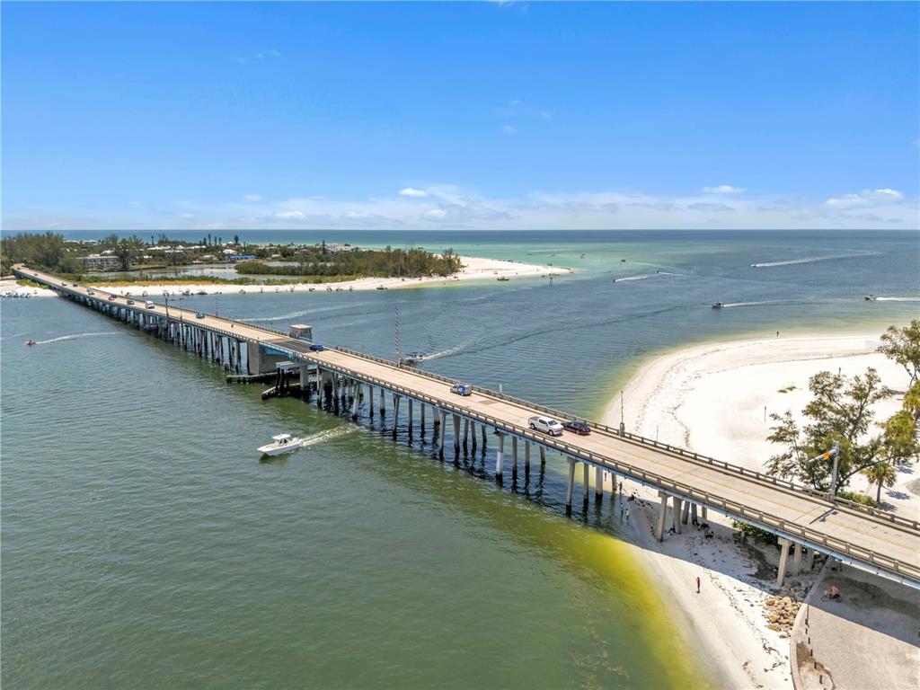 2600 Harbourside Drive, Unit R9 Longboat Key, FL 34228 - Photo 22 of 26 a view of an ocean and beach