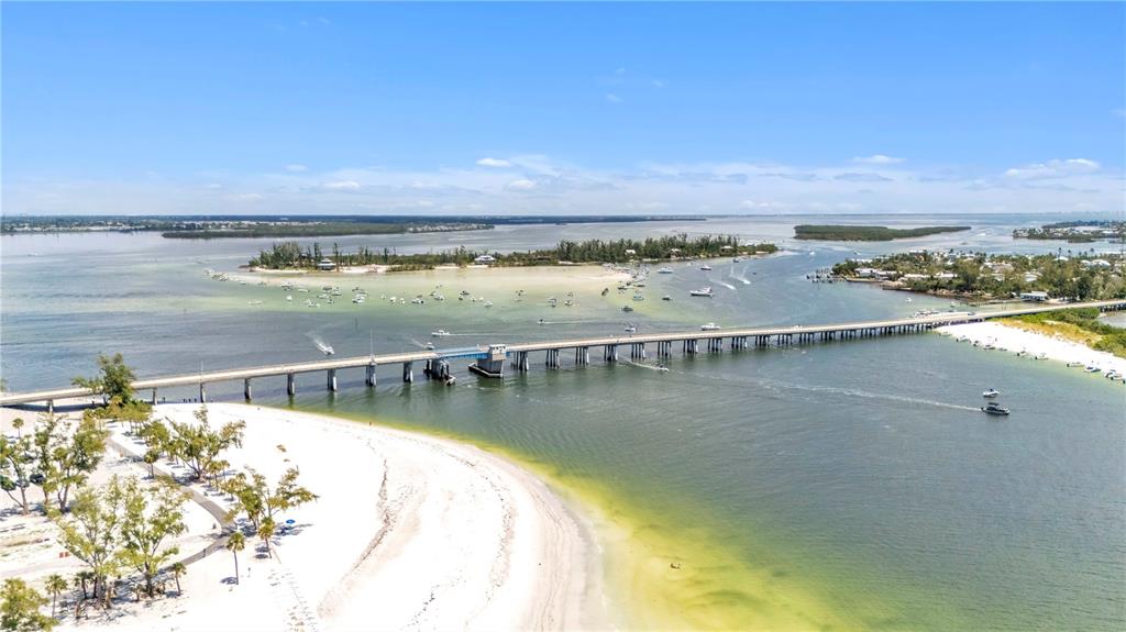 2600 Harbourside Drive, Unit R9 Longboat Key, FL 34228 - Photo 24 of 26 an aerial view of a house with a lake view