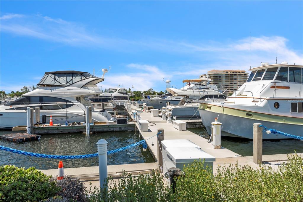 2600 Harbourside Drive, Unit R9 Longboat Key, FL 34228 - Photo 8 of 26 a view of a balcony with chairs
