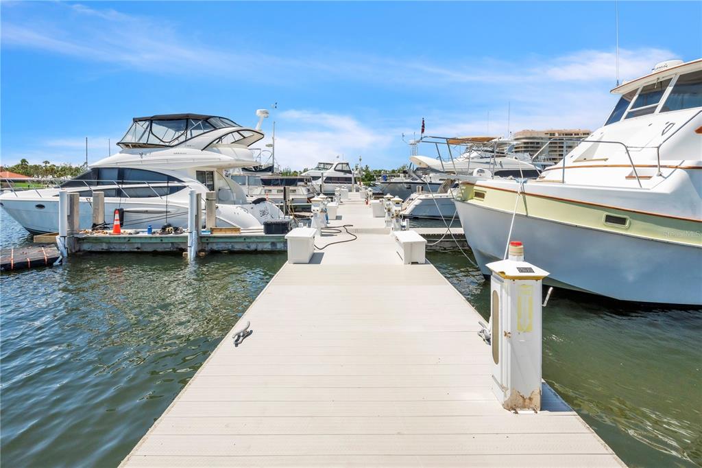 2600 Harbourside Drive, Unit R9 Longboat Key, FL 34228 - Photo 9 of 26 a view of a lake with building