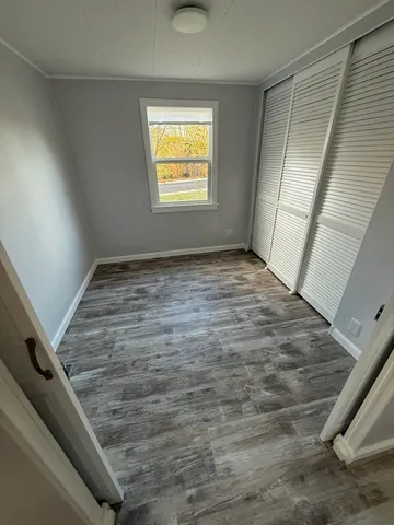 a view of an empty room and window