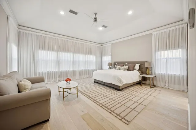 a bedroom with a bed and a couch