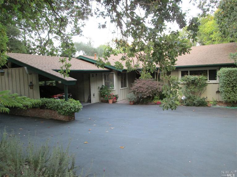 415 Bloomfield Road Sebastopol, CA 95472 - Photo 1 of 1 a front view of a house with garden