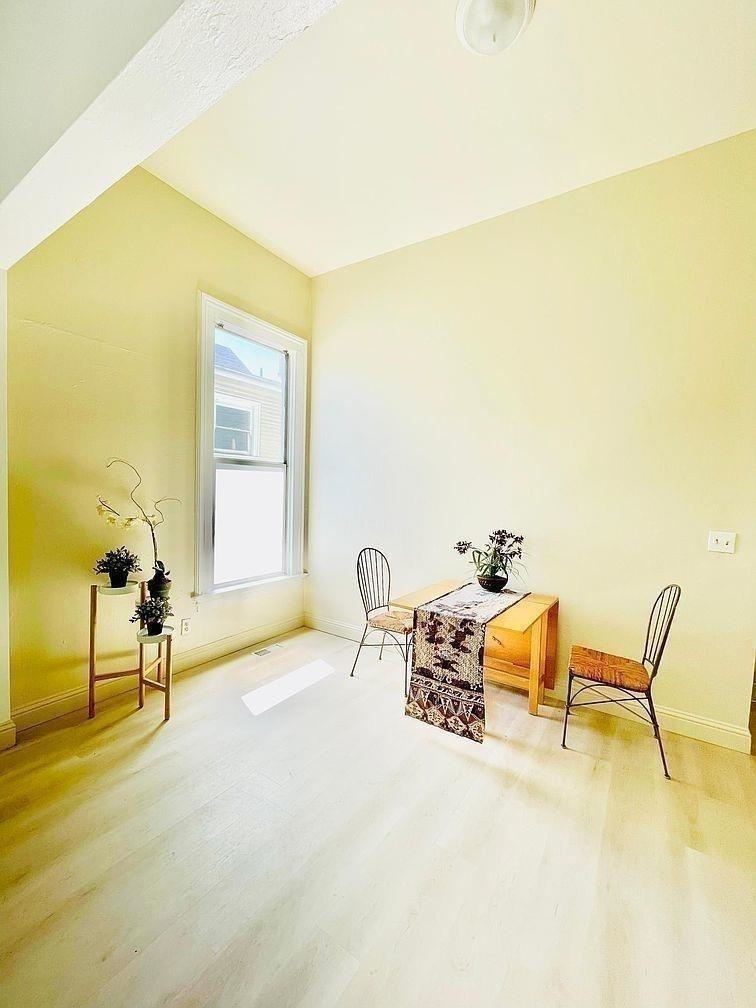 1432 Union Street, Unit UPPR Oakland, CA 94607 - Photo 14 of 27 Dining Area Staged in lower level