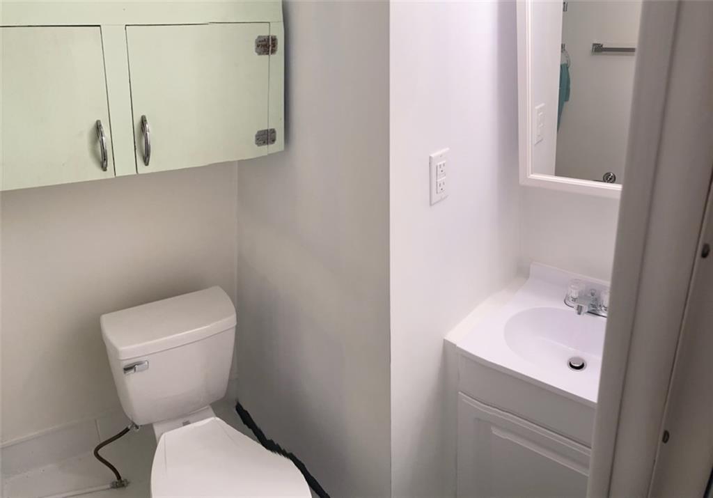 4341 Highway 66 Apollo, PA 15613 - Photo 18 of 21 a bathroom with a toilet sink and mirror