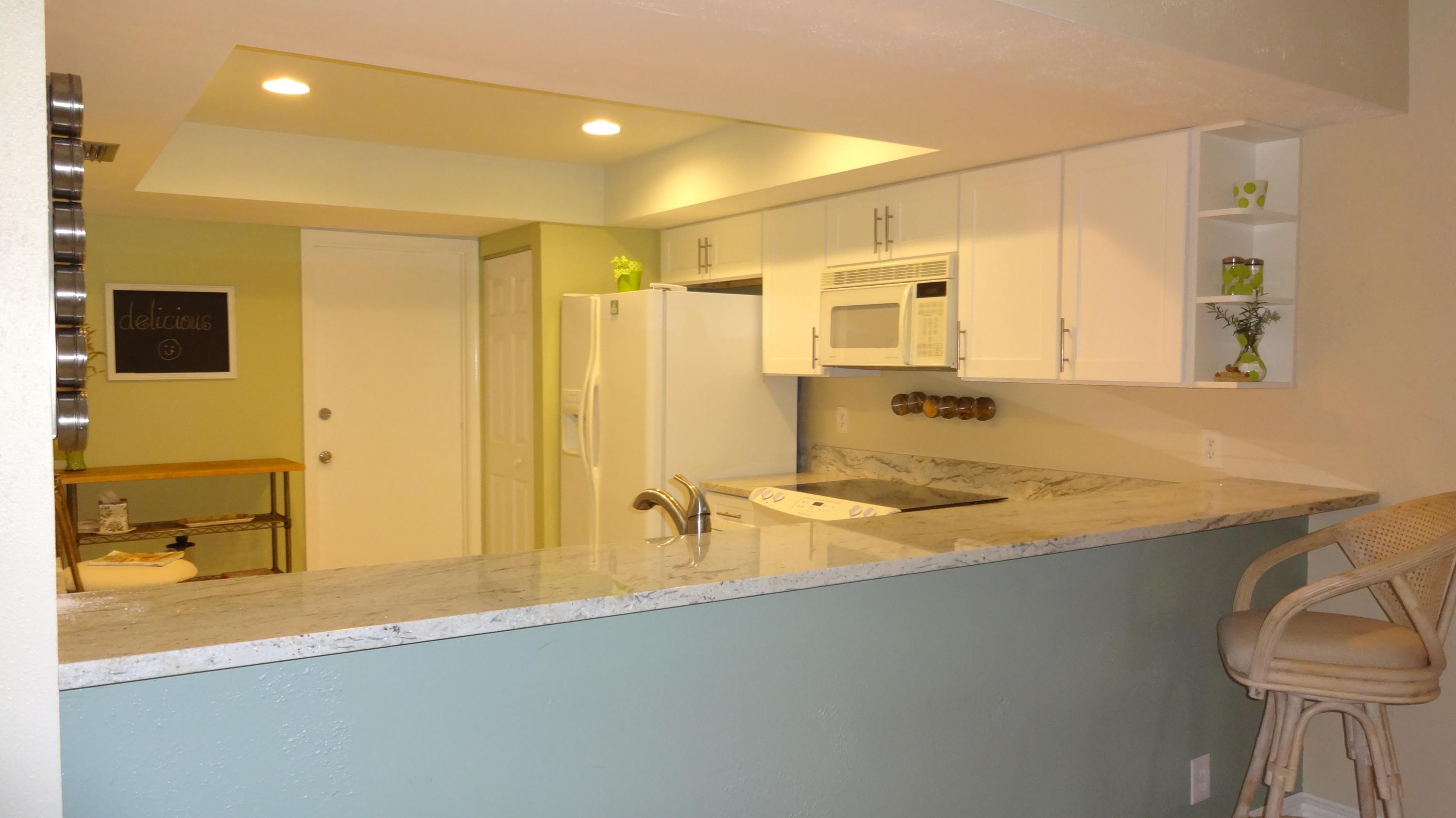 454 Ashwood Place Boca Raton, FL 33431 - Photo 2 of 26 kitchen with large pass through bar