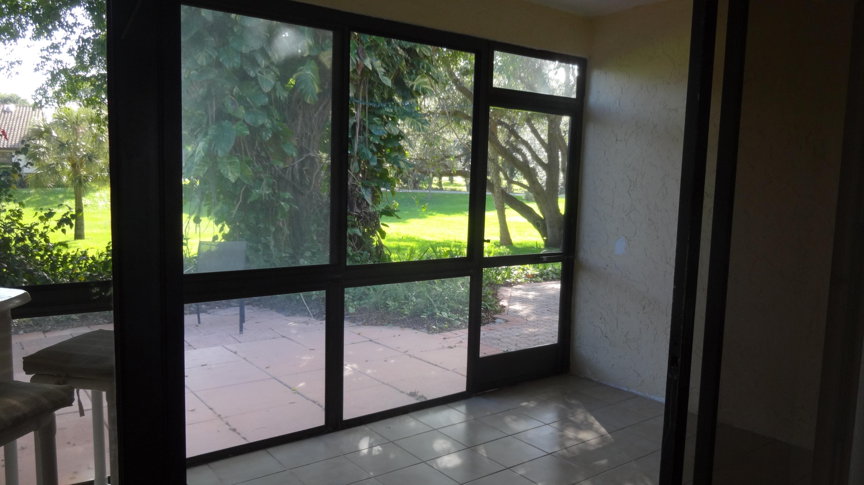 454 Ashwood Place Boca Raton, FL 33431 - Photo 23 of 26 screened/covered patio