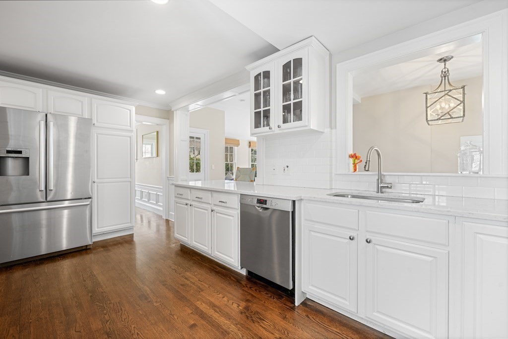19 Elmwood Road Wellesley, MA 02481 - Photo 13 of 41 a kitchen with sink cabinets and stainless steel appliances