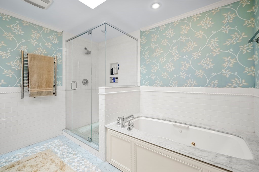 19 Elmwood Road Wellesley, MA 02481 - Photo 29 of 41 a bathroom with a bathtub and a shower