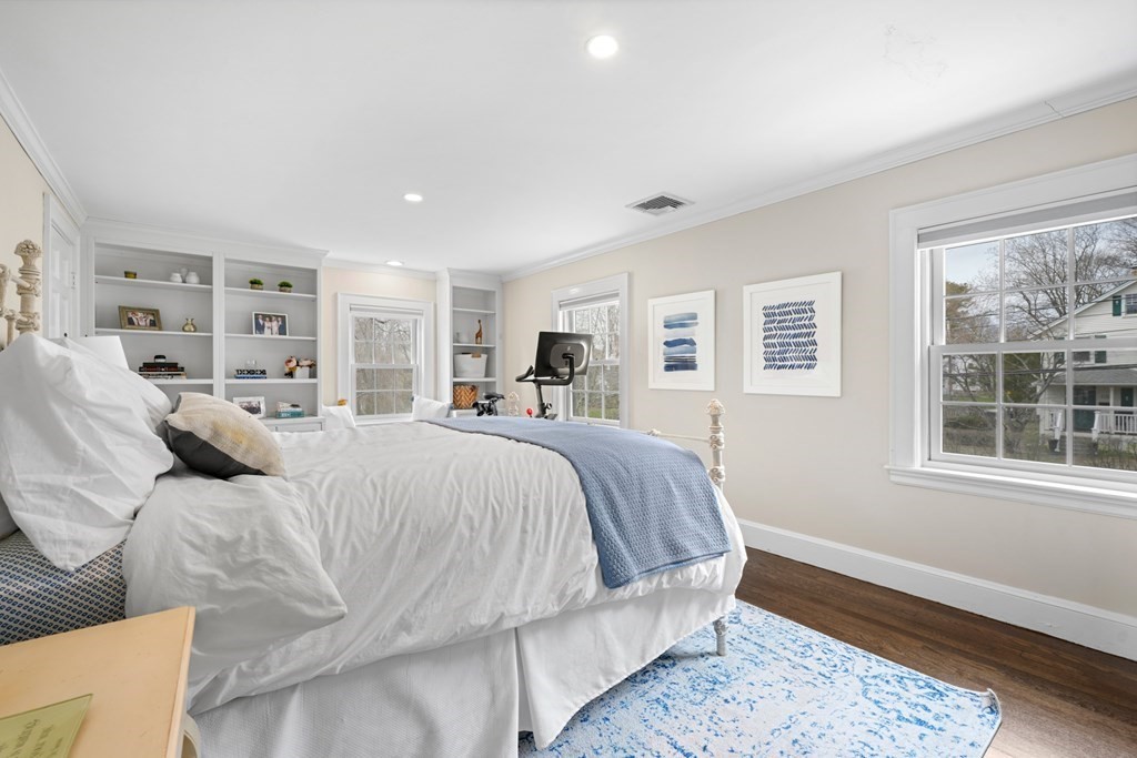 19 Elmwood Road Wellesley, MA 02481 - Photo 30 of 41 a bedroom with a large bed and a window