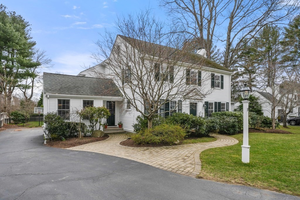 19 Elmwood Road Wellesley, MA 02481 - Photo 3 of 41 a front view of a house with garden