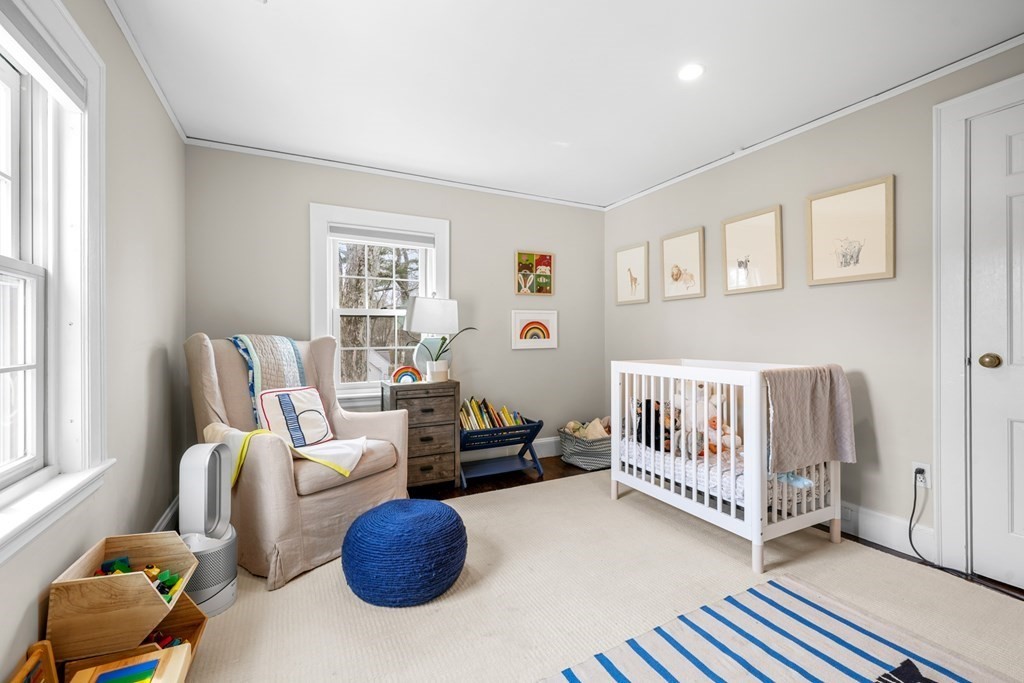 19 Elmwood Road Wellesley, MA 02481 - Photo 31 of 41 a bedroom with furniture and a window