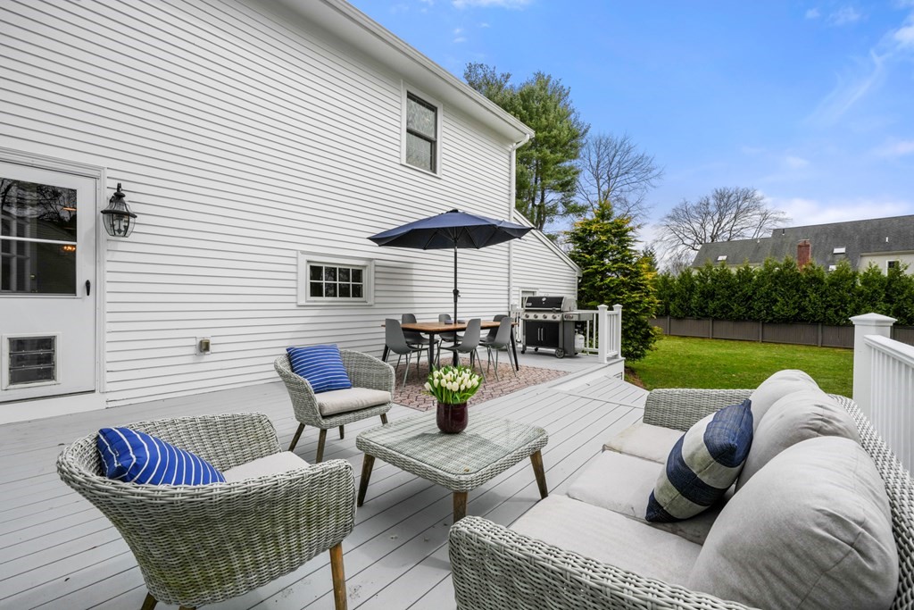 19 Elmwood Road Wellesley, MA 02481 - Photo 35 of 41 a view of a patio with couches chairs and a table and chairs