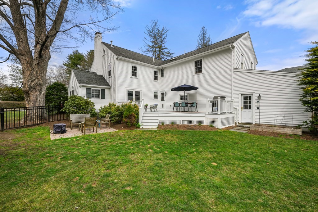 19 Elmwood Road Wellesley, MA 02481 - Photo 37 of 41 a view of house with backyard and sitting area
