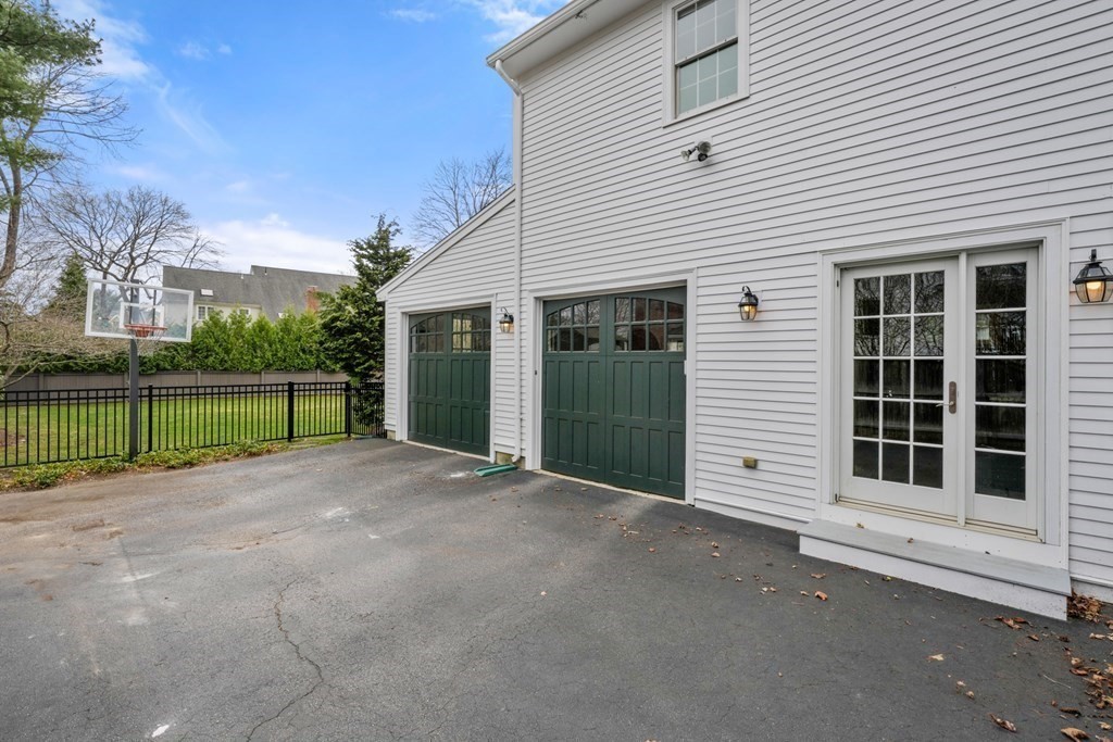 19 Elmwood Road Wellesley, MA 02481 - Photo 41 of 41 a view of a house with a backyard