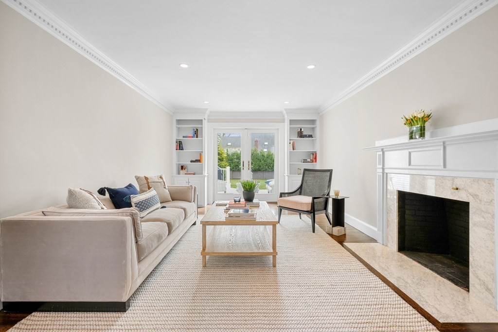 19 Elmwood Road Wellesley, MA 02481 - Photo 8 of 41 a living room with furniture and a fireplace
