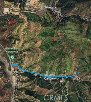 a view of a tree with a yard