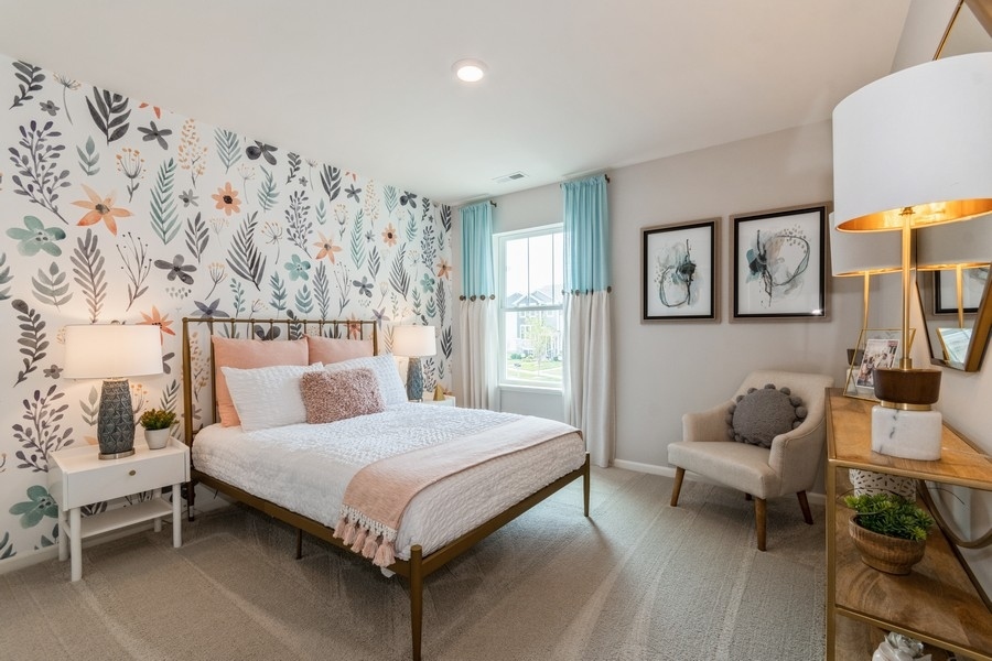1238 Draper Road McHenry, IL 60050 - Photo 11 of 14 a bedroom with a bed and lamp