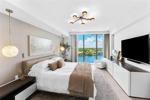 a spacious bathroom with a double vanity sink tub and mirror