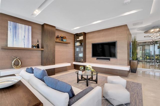 a kitchen with stainless steel appliances a refrigerator and a sink