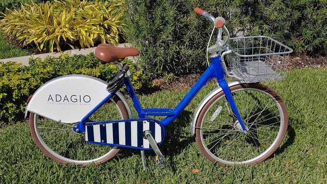 a view of a water with tall buildings