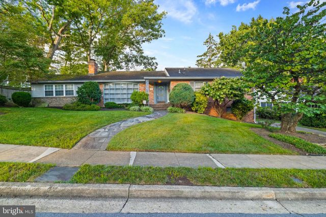 a view of a big yard next to a house