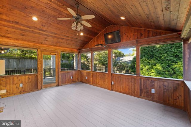 a view of an empty room with a balcony