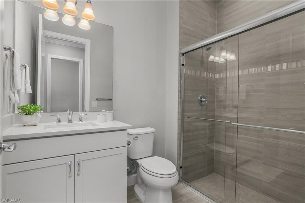 19040 Marquesa Drive Fort Myers, FL 33913 - Photo 26 of 50 Guest bath with upgraded walk-in shower.