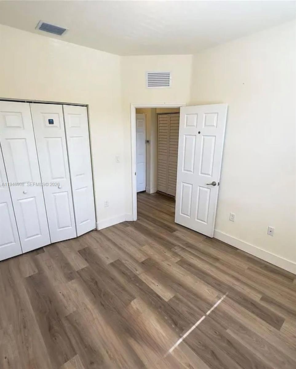 3349 West 105th Terrace, Unit 3349 Hialeah, FL 33018 - Photo 6 of 10 a view of a livingroom with an empty space
