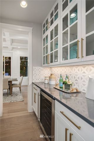 a living room with granite countertop furniture and window