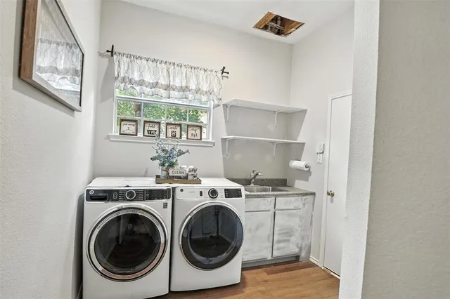 a view of washer and dryer in a utility room