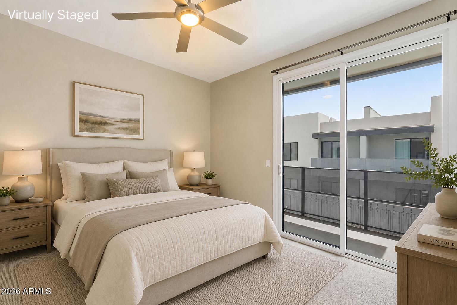 901 South Smith Road, Unit 1038 Tempe, AZ 85281 - Photo 20 of 29 a bedroom with a large bed and a chandelier